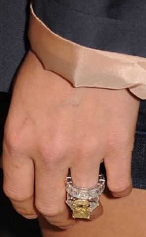 Anna Kournikova Radiant cut Canary Yellow Diamond engagement ring with