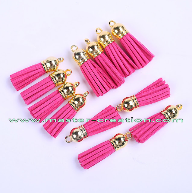 gold capped pink tassels