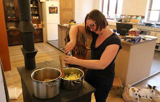 A hard at work making Leek and Potato soup