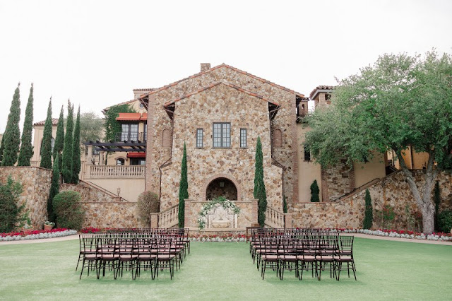 Bella Collina wedding ceremony setup with brown chairs