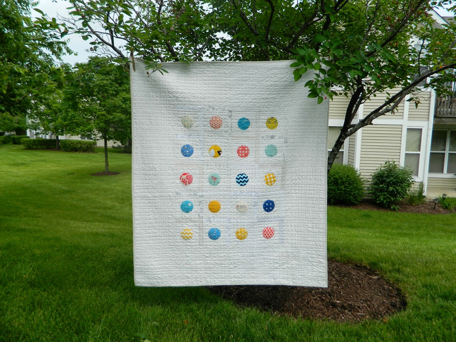 http://sotakhandmade.blogspot.com/2014/06/dots-finished-quilt.html