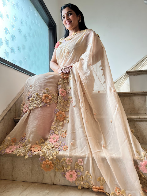 Sandalwood French chiffon saree with hand done flowers.