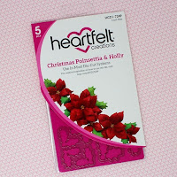 https://www.heartfeltcreations.us/product-collections/candlelit-christmas/christmas-poinsettia-holly-die