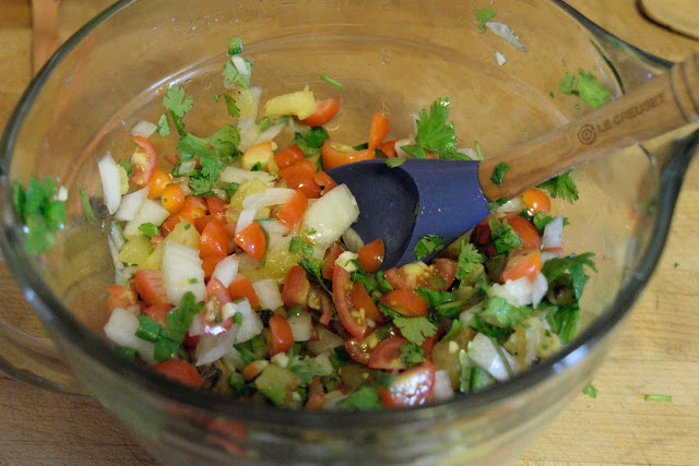 The grilled pineapple salsa all mixed together in the bowl.