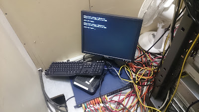 Network router on floor under debug console