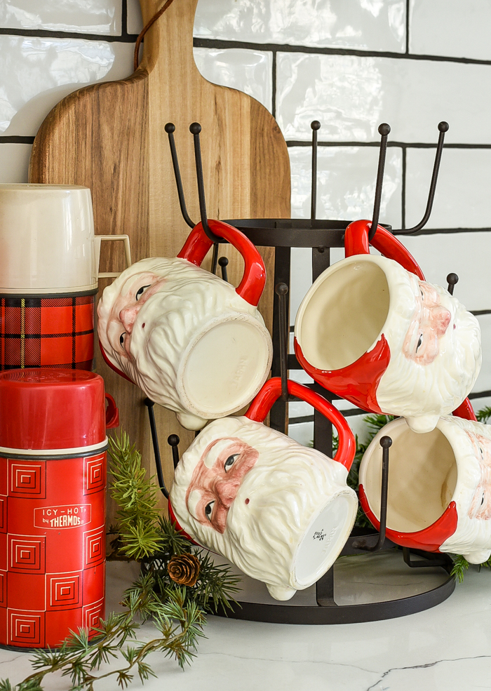 Displaying vintage santa mugs on mug tree