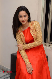 Telugu Actress Divya Nandini Stills in Orange Sleeveless Gown at Chennai Chaitrama Movie le Launch Event  0101.JPG