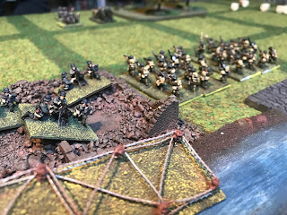 The British infantry ready themselves to attack the HMG positions at Ors