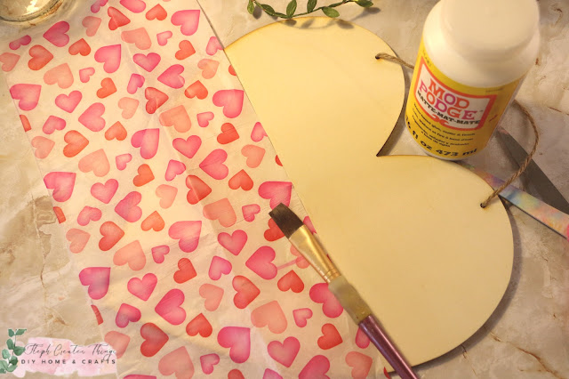 Mod Podge and tissue paper over wooden heart