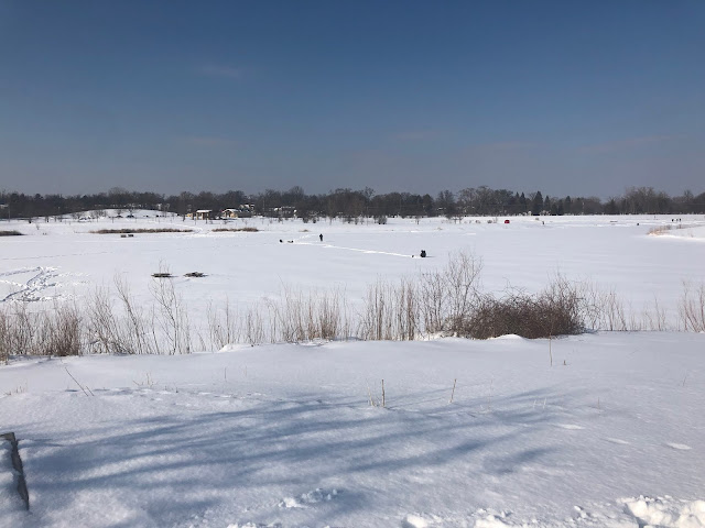 Ice fishing at Hidden Lake Forest Preserve in winter.