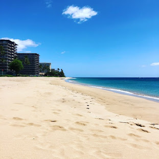White sand of Kaanapali Beach with condos in background | Kaanapali Alii