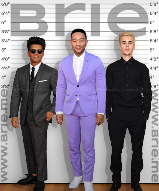 John Legend standing with Bruno Mars and Justin Bieber