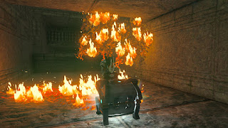 opening a chest inside the Lomei Labyrinth wearing the Evil Spirit set with burning flames right behind me