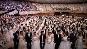 Couples attend a mass wedding ceremony of the Unification Church at Cheongshim Peace World Centre in Gapyeong, South Korea, August 27, 2018. REUTERS/Kim Hong-Ji Read more at https://www.channelnewsasia.com/news/asia/new-generations-sustain-south-korean-church-s-mass-weddings-10657820