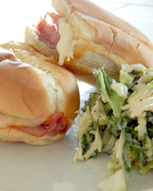 Hot Italian Baked Subs...every Mom's dream meal!  Just 10 minutes to assemble and 10 minutes to bake.  Salami, pepperoni, ham, cheese, butter and seasonings, the perfect answer for busy weeknights. (sweetandsavoryfood.com)