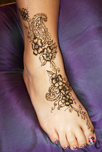 tree of life tattoo foot. 2010 nice flower foot tattoo