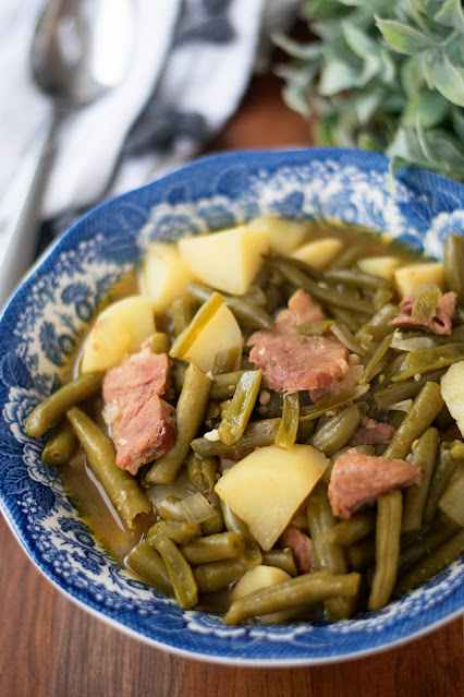 A bowl of country style green beans with potatoes