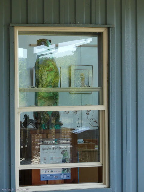 painted otter in the window