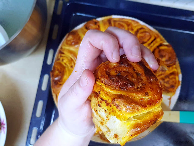 pizza pull apart pastry slice in hand