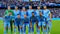 MANCHESTER CITY F. C. Temporada 2021-22. Ederson, Rodri, Kevin De Bruyne, Aymeric Laporte, John Stones, Rúben Dias. Bernardo Silva, Phil Foden, Zinchenko, Mahrez y Gabriel Jesus. MANCHESTER CITY F. C. 4 REAL MADRID C. F. 3 Martes 26/04/2022, 21:00 horas. Liga de Campeones de la UEFA, semifinal, partido de ida. Manchester, Inglaterra, Reino Unido, Etihad City of Manchester Stadium: 52.217 espectadores. GOLES: 1-0: 2’, Kevin De Bruyne. 2-0; 11’, Gabriel Jesus. 2-1: 33’, Karim Benzema. 3-1: 53’, Phil Foden. 3-2: 55’, Vinícius Júnior. 4-2: 74’, Bernardo Silva. 4-3: 82’, Karim Benzema, de penalti.