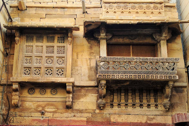 elegantly crafted windows and Jharokhas of houses in Jaisalmer