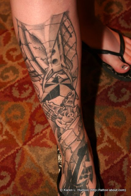 cross tattoos on calf. Lower leg tattoo mix Maori