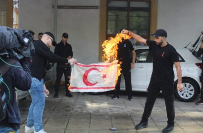 Greek Cypriot youths set TRNC flag on fire