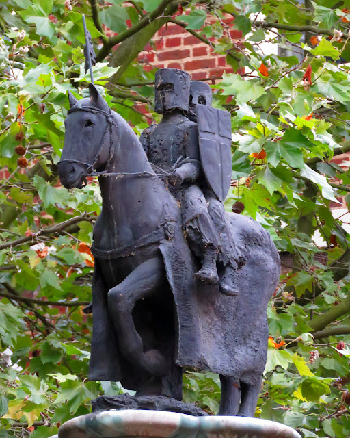 The Two Riders on top the Knights Templar pillar, Church Court, Inner Temple, London