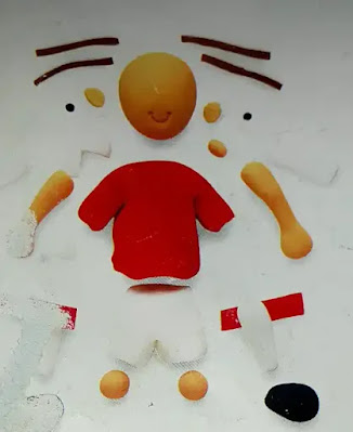 image of body parts of football crazy cake
