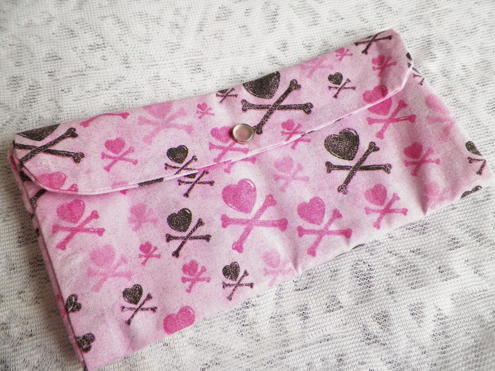 https://www.etsy.com/listing/122183034/pink-girly-heart-and-crossbones-fabric