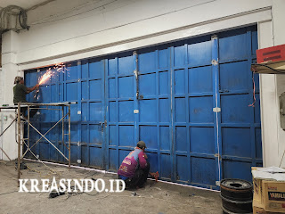 Reparasi Pintu Lipat Gudang Hasta Bersama di Jalan Raya Bogor KM 37 Cilodong Depok