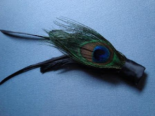 Black Peacock Eye Boutonniere