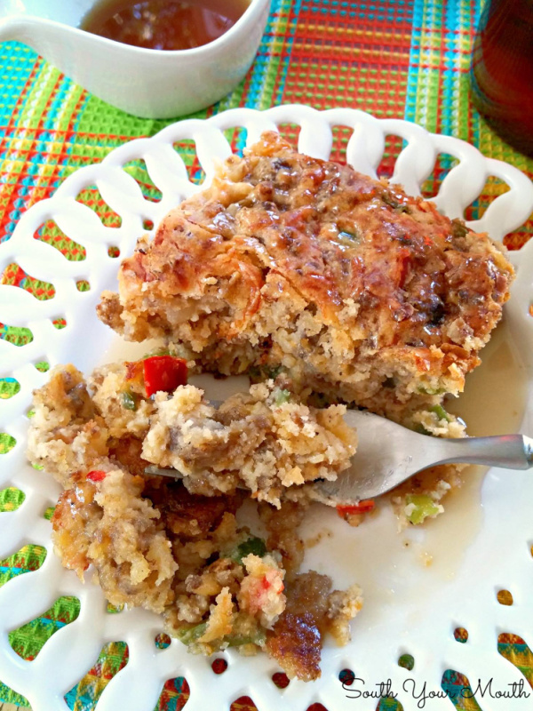 Savory Sausage Breakfast Cake with Hot Maple Syrup! The original savory breakfast biscuit cake loaded with sausage, onions and peppers served with hot maple syrup perfect for brunch and breakfast buffets.