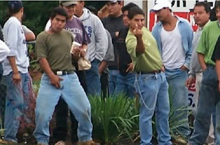 illegal aliens, illegal immigration, flipping the bird, the finger, grabbing crotch
