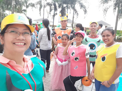 Parents and staff participating in Halloween Party for kids in Light Residences condo in Mandaluyong City, Philippines