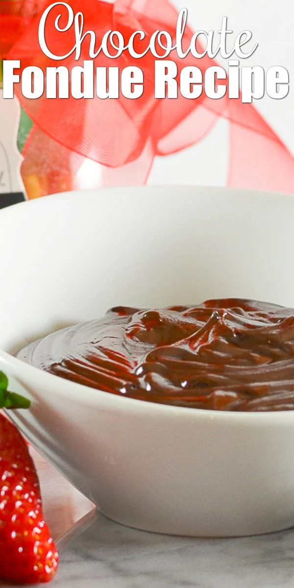 Easy Chocolate Fondue is a family favorite! So easy to make in about 5 minutes with a thick fudge consistency make it perfect for dipping strawberries, pretzel rods, dried fruit, cookies or anything else your heart desires. Fudge Fondue is the perfect recipe for Valentines Day or Easter from Serena Bakes Simply From Scratch.