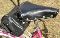purse remade as saddlebag pink Schwinn suburban bike