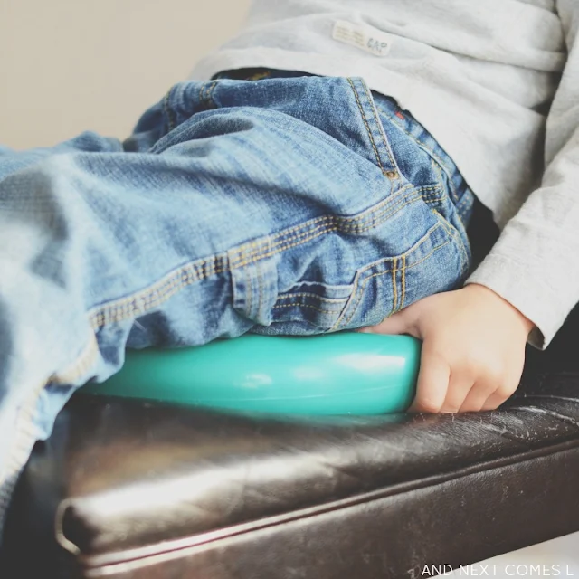 Using a balance cushion to help fidgety kids sit still during mealtimes from And Next Comes L