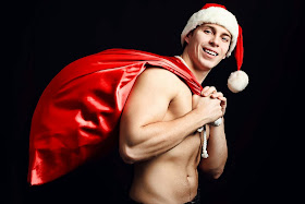 sexy shirtless santa with his sack