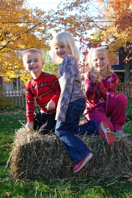 Fall kid photos with a hay bale