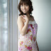 Marie Kai in flower-print dress