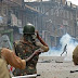 Clash with india police :Kashmiri demonstrators clash with Indian police and soldiers during a demonstration against Israeli military operations in Gaza, in downtown Srinagar on July