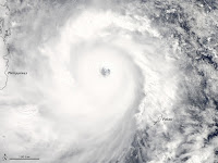 Super Typhoon Haiyan as it headed toward landfall in the Philippines, where it caused enormous destruction. (Credit: NASA) Click to Enlarge.