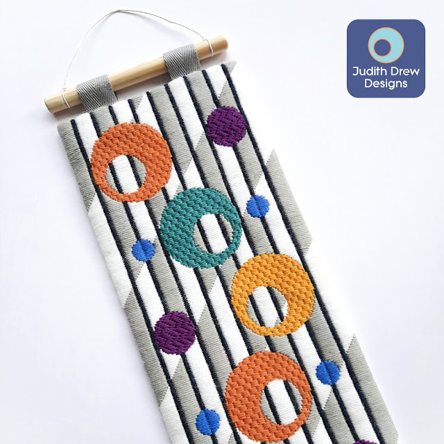 Judith Drew Designs finished Annular Cascade retro style wall hanging.