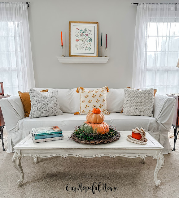 white living room fall pillows coffee table pumpkin topiary