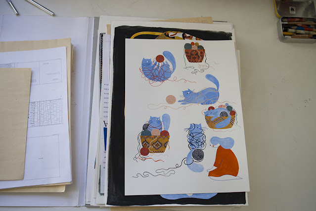 Woven of the World Original Illustrations by Folk Artist Dinara Mirtalipova, shown in the photo a blue cat playing with yarn