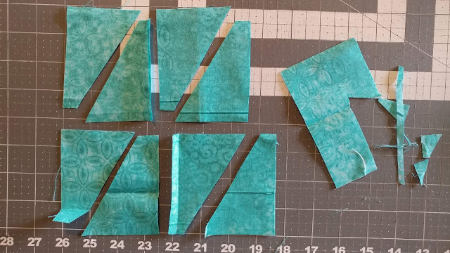 Batiks and solids for a modern Teal Mini Swap Quilt