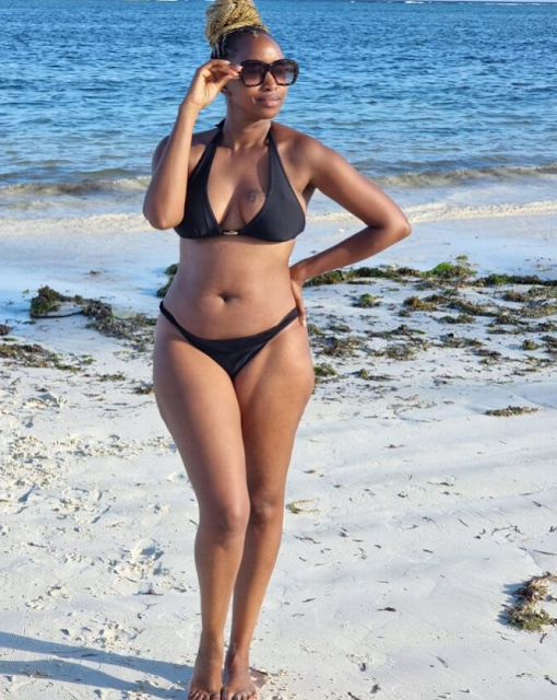 former Citizen TV presenter Janet Mbugua photo at the beach with Bikini