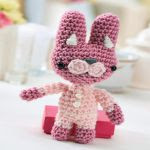 http://www.topcrochetpatterns.com/images/uploads/pattern/bunny-toy.pdf