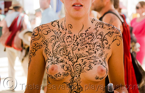 This is one interesting example of a henna tattoo on the breast